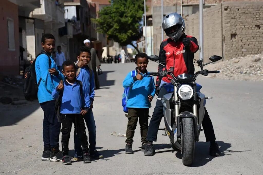 Ali Abdo seen on his trip, 'The Ride to Cop27.' Media sourced from MCN.