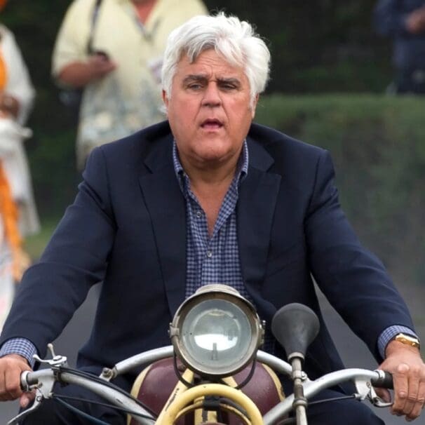 Jay Leno riding one of his vintage motorcycles. Media sourced from Entertainment Tonight.