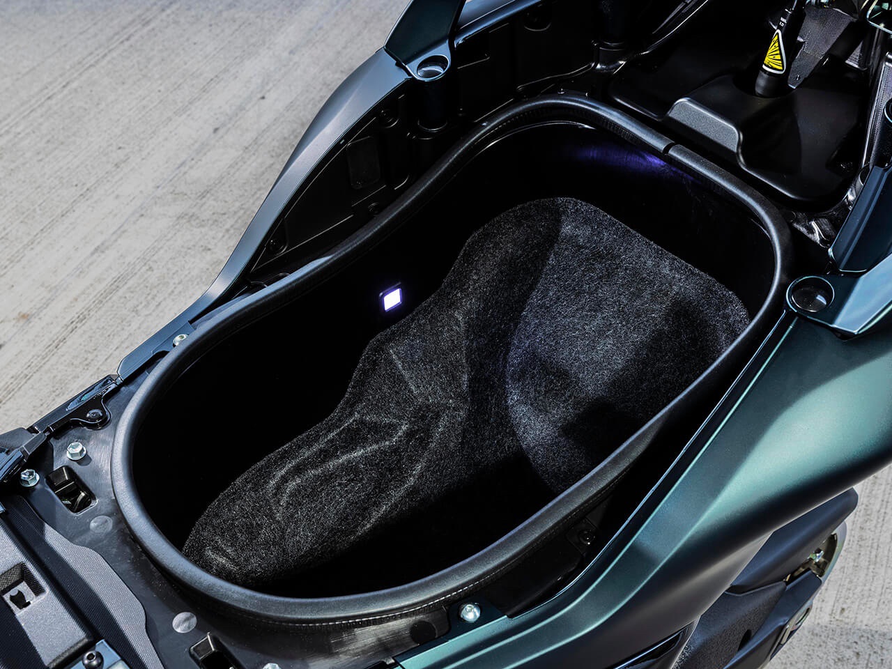 A 2022 Yamaha TMAX Tech MAX Scooter's storage compartment