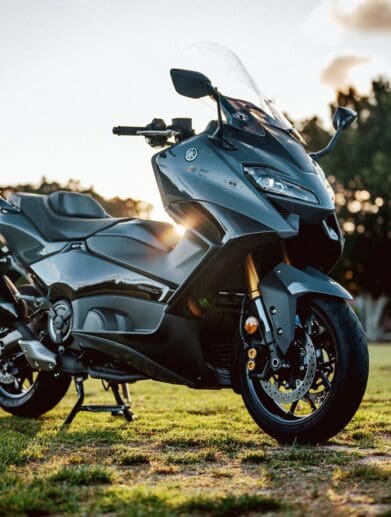 A 2022 Yamaha TMAX Tech MAX Scooter outside at sunset