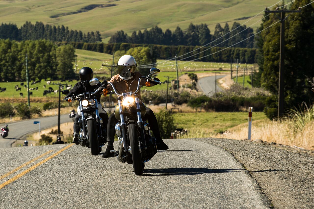 BMX and mountain bike racing couple Barry Nobles of the USA and Aussie Olympian Carline Buchanan share a passion for two wheels that extends to their Harleys.