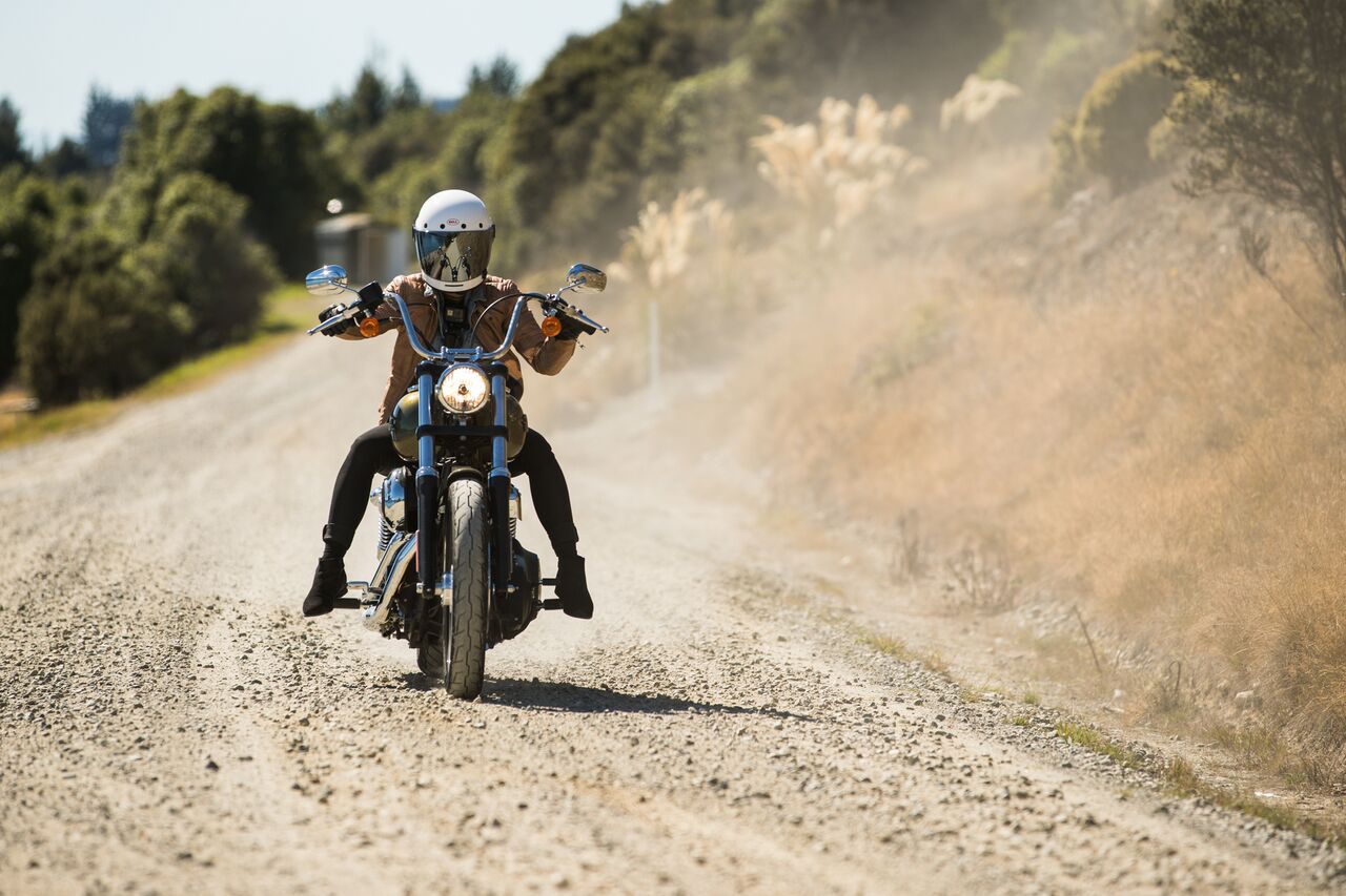 BMX and mountain bike racing couple Barry Nobles of the USA and Aussie Olympian Carline Buchanan share a passion for two wheels that extends to their Harleys.