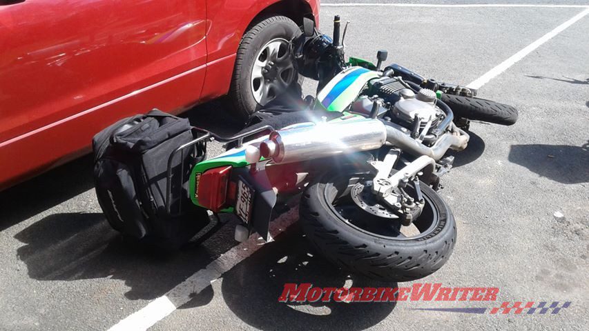 Toowoomba riding trainer Tony Gallagher watched in horror as his Kawasaki ZRX1200R sunk into thin bitumen and tall over in a Crows Nest main street parking bay.