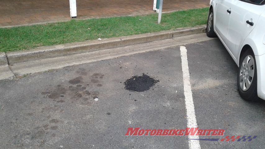 Toowoomba riding trainer Tony Gallagher watched in horror as his Kawasaki ZRX1200R sunk into thin bitumen and tall over in a Crows Nest main street parking bay.