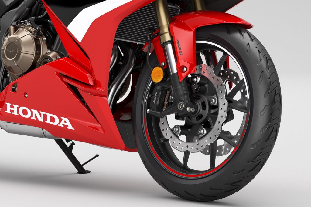 A first close-up view of the 2022 CR500R, front wheel.