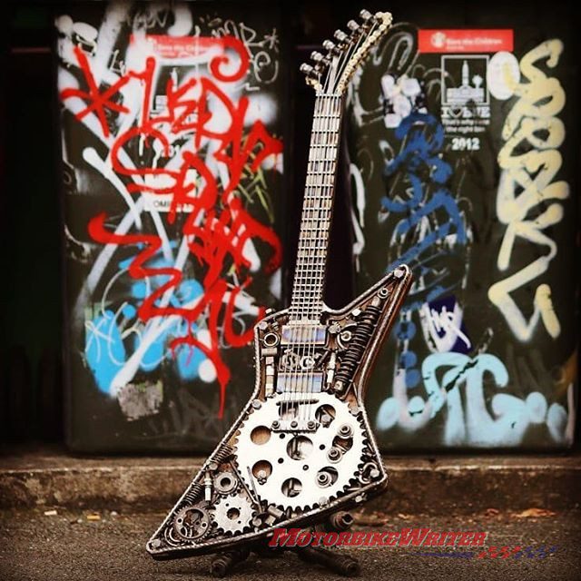 Artist Paul Tinson uses motorcycle parts for guitar sculptures guitars