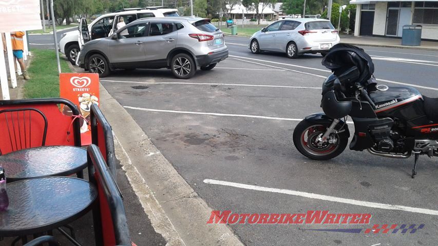 Toowoomba riding trainer Tony Gallagher watched in horror as his Kawasaki ZRX1200R sunk into thin bitumen and tall over in a Crows Nest main street parking bay.