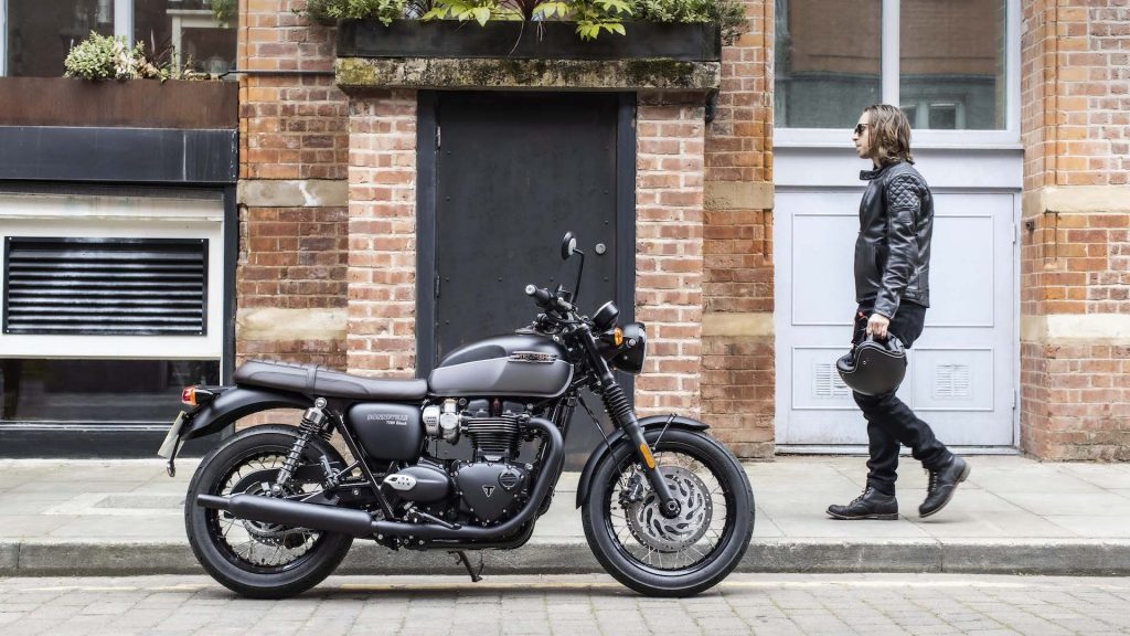 A view of a rider and a Triumph motorcycle riding for Triumph's Ride Out To Help Out Campaign