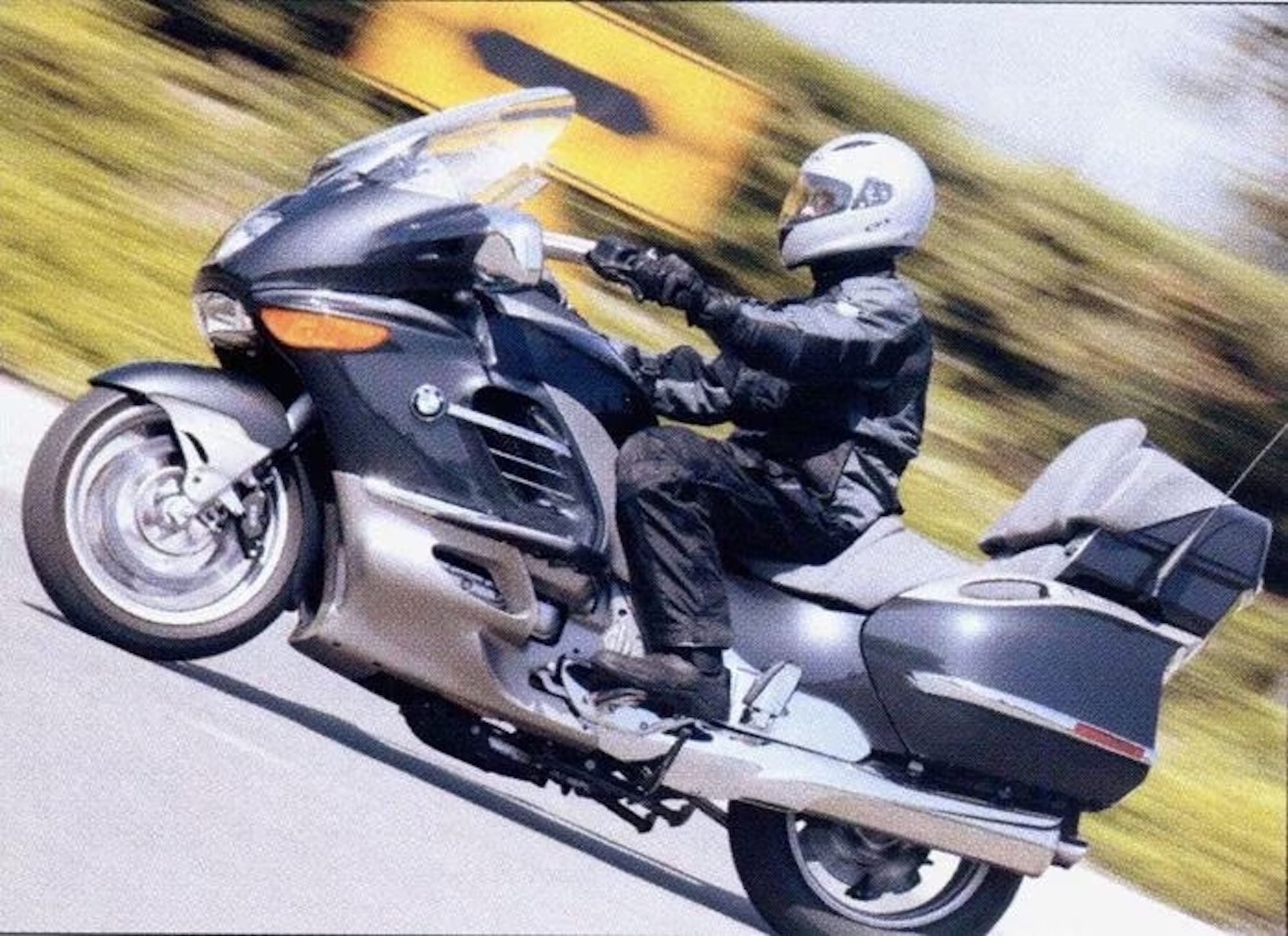 A view of BMW's 2004 K1200 LT, which featured a hydraulic/electronic stand. Media sourced from CycleWorld.