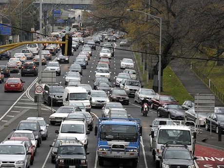 Bike lanes lane filtering ride to work tax congestion