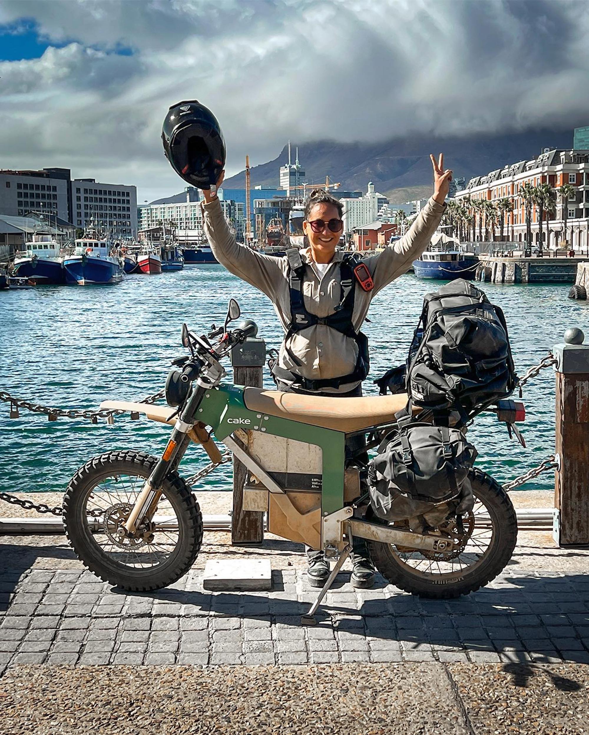 Sinje Gottwald, CAKE’s sales/account manager, behind a Kalk as she breaks a new record for longest distance ever on an electric motorcycle. Media sourced from CAKE's Facebook page.