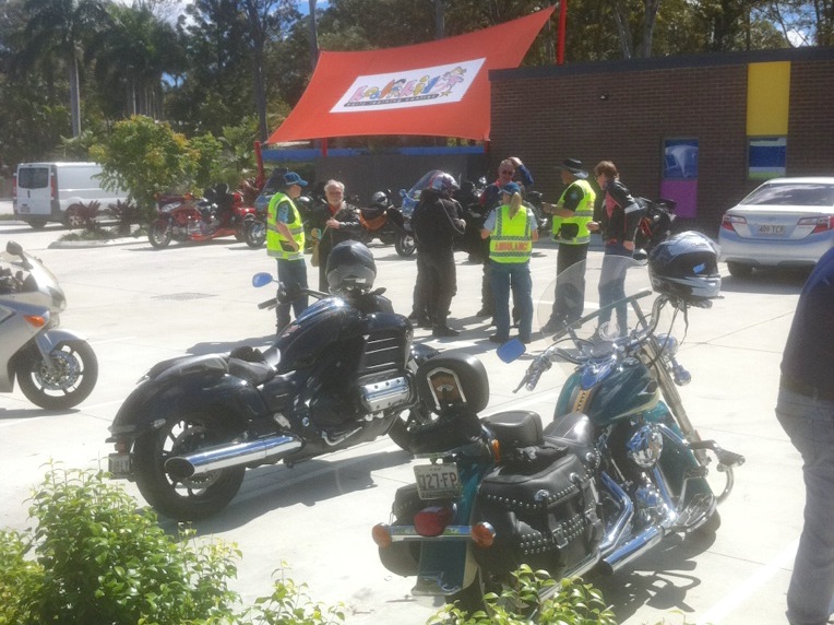 Police talk to riders at a 2016 Operation North Upright event enforce