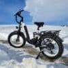 Ebike parked on sidewalk in the winter