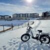 Cyrusher on snow path leading to a park