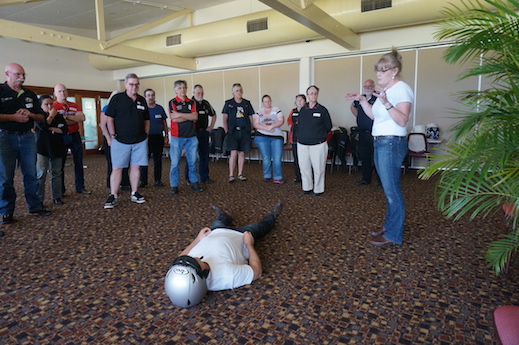 First Aid for Motorcyclists instructor Tracey Hughes with husband Roge Fance playing the casualty