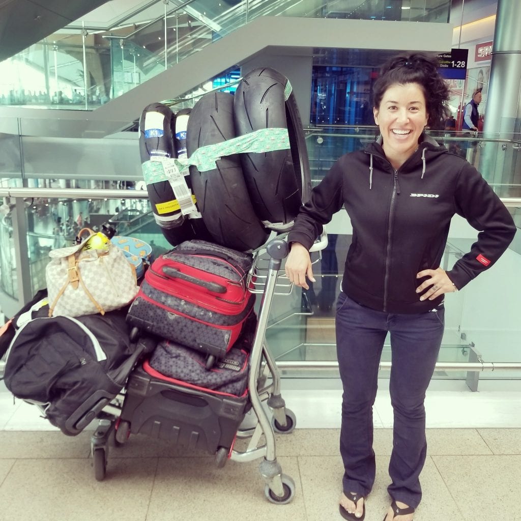 Patricia Fernandez in transit with her tires for racing