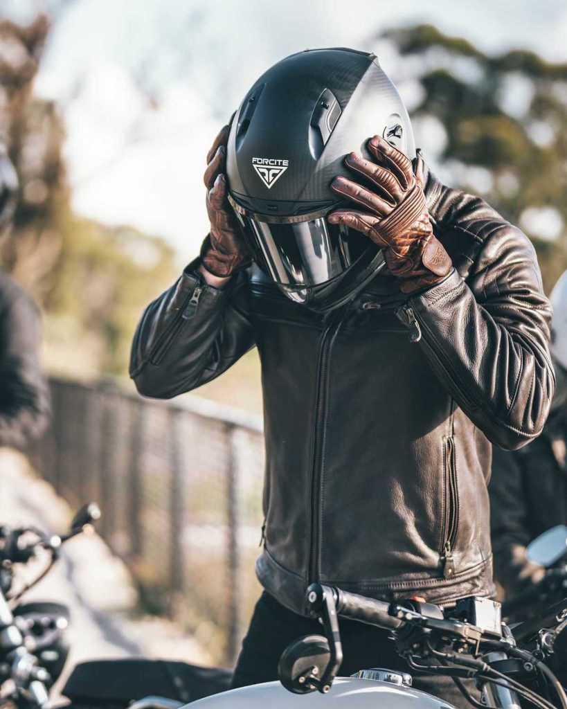 A rider taking off his Forcite helmet. Media sourced from Equitise.