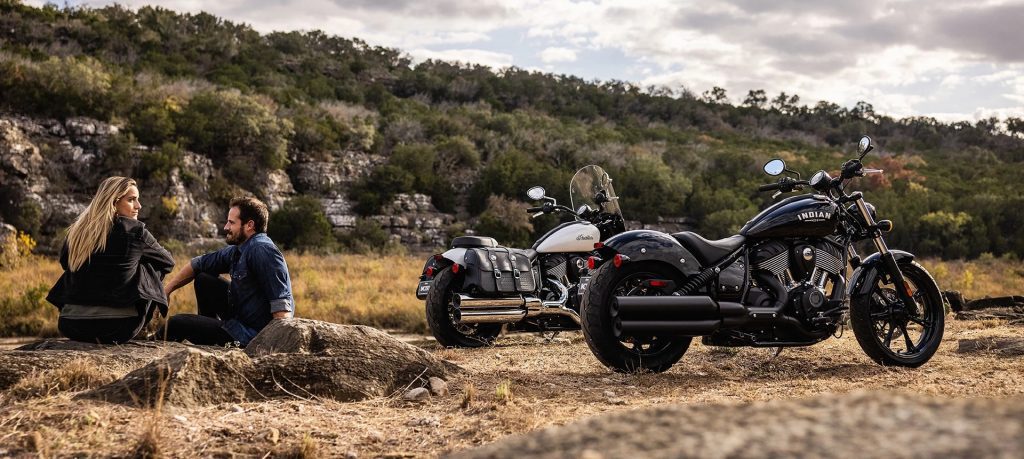 A view of two 2022 Indian Chiefs, with riders enjoying the dusty landscape.