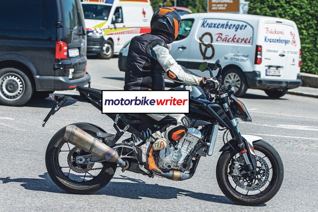 a back right view of spy shots taken of a new KTM machine