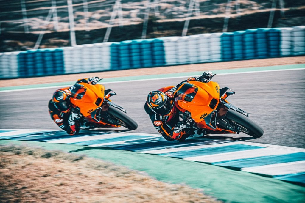 A front view of riders battling on the all-new track-only 2022 KTM RC 8C