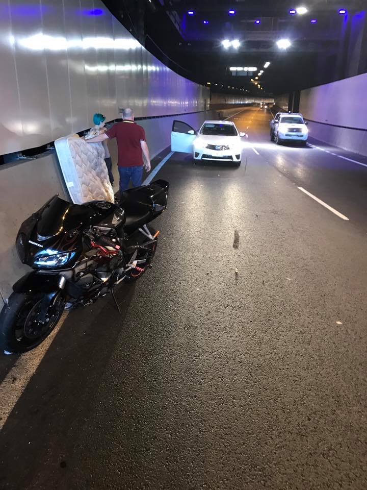 Rider hits unsecured mattress in tunnel