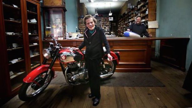 Mrs Beanham in her Modak Motorcycles shop Rally to honour motorcycle shop icon