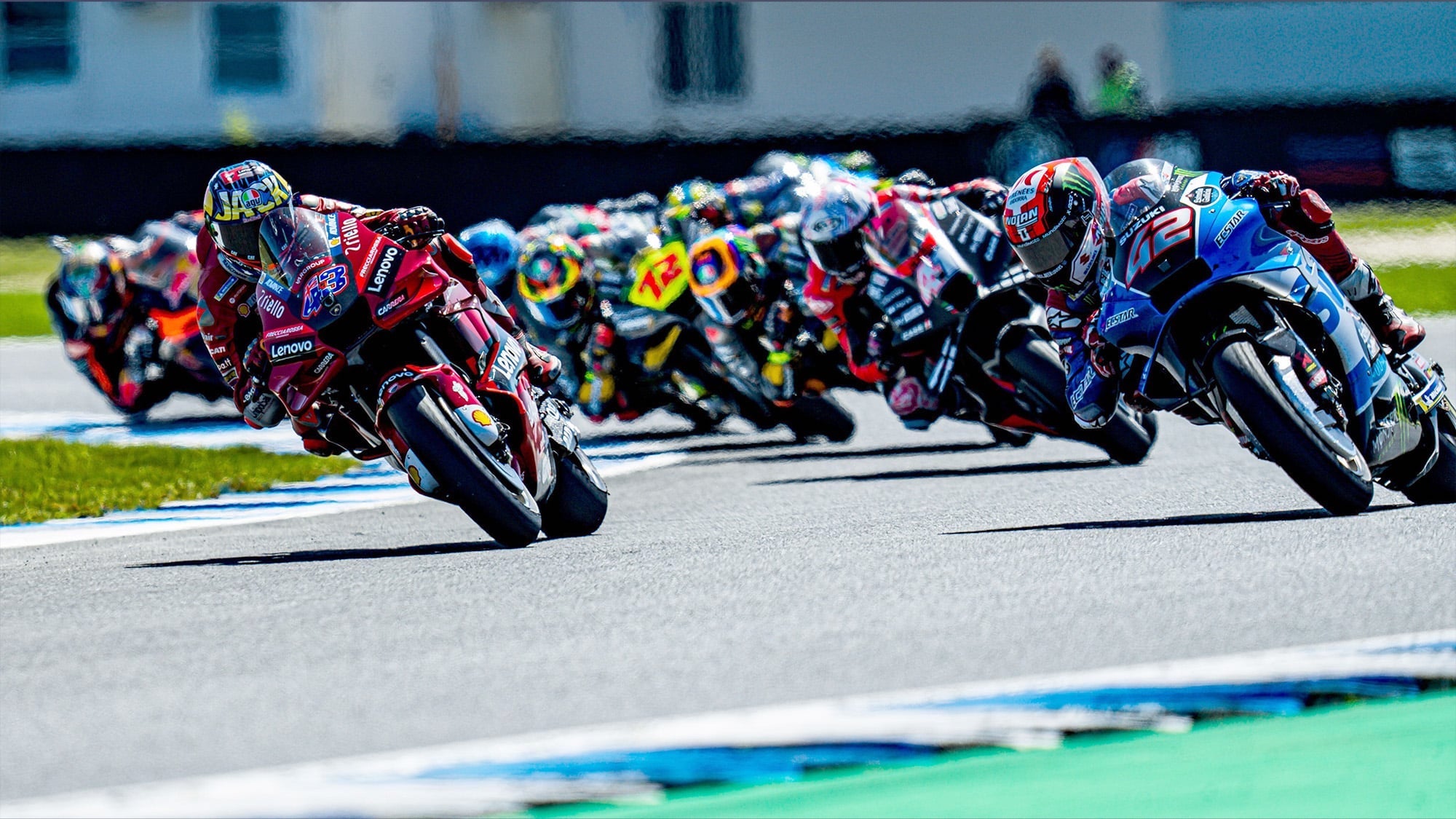 A view of racers on the MotoGP grid, doing what they do best. Media sourced from Motor Sport Magazine.