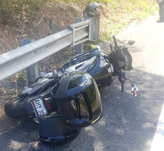 Melting tar claims first crash victim Mt Glorious - broken leg