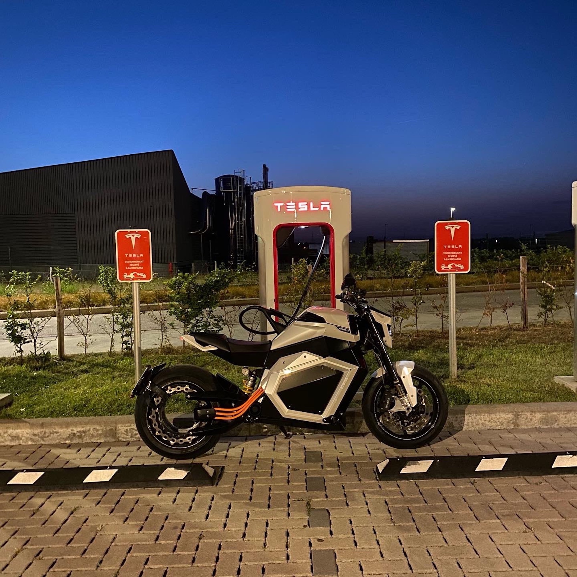 A view of a Tesla Supercharger. Media sourced from Reddit.