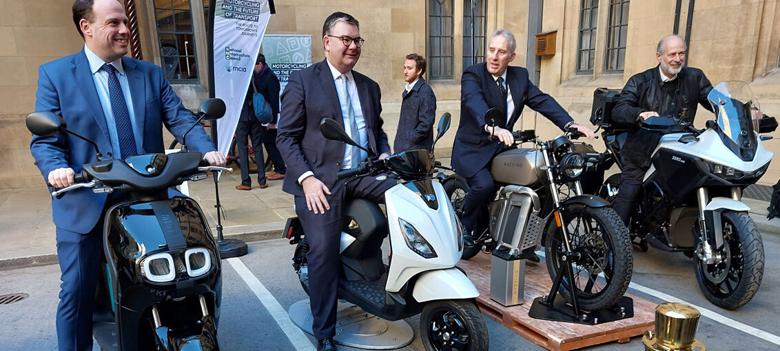 Members of MCIA, NMC and Parliament sitting on bikes. Media sourced from the British Motorcyclists Federation.