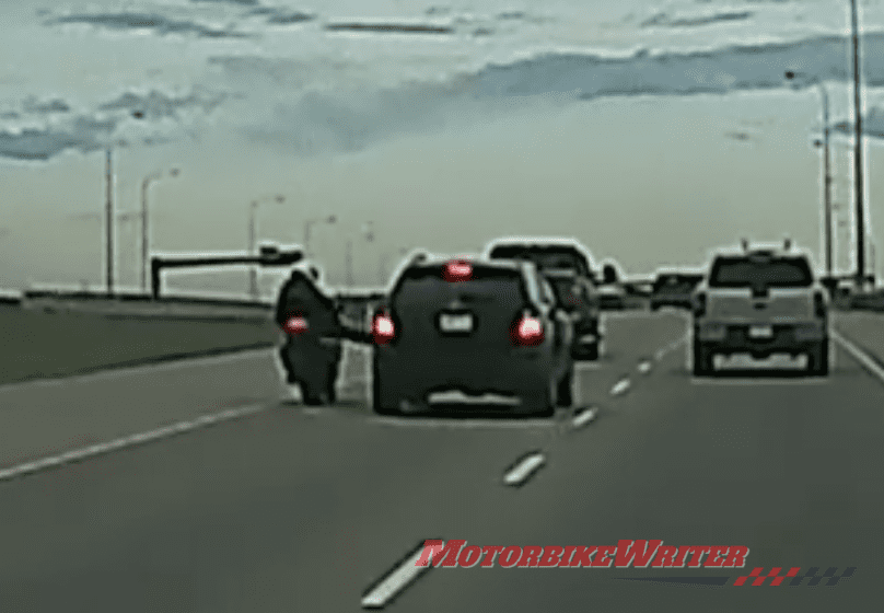 Rider punches and kicks SUV in road rage