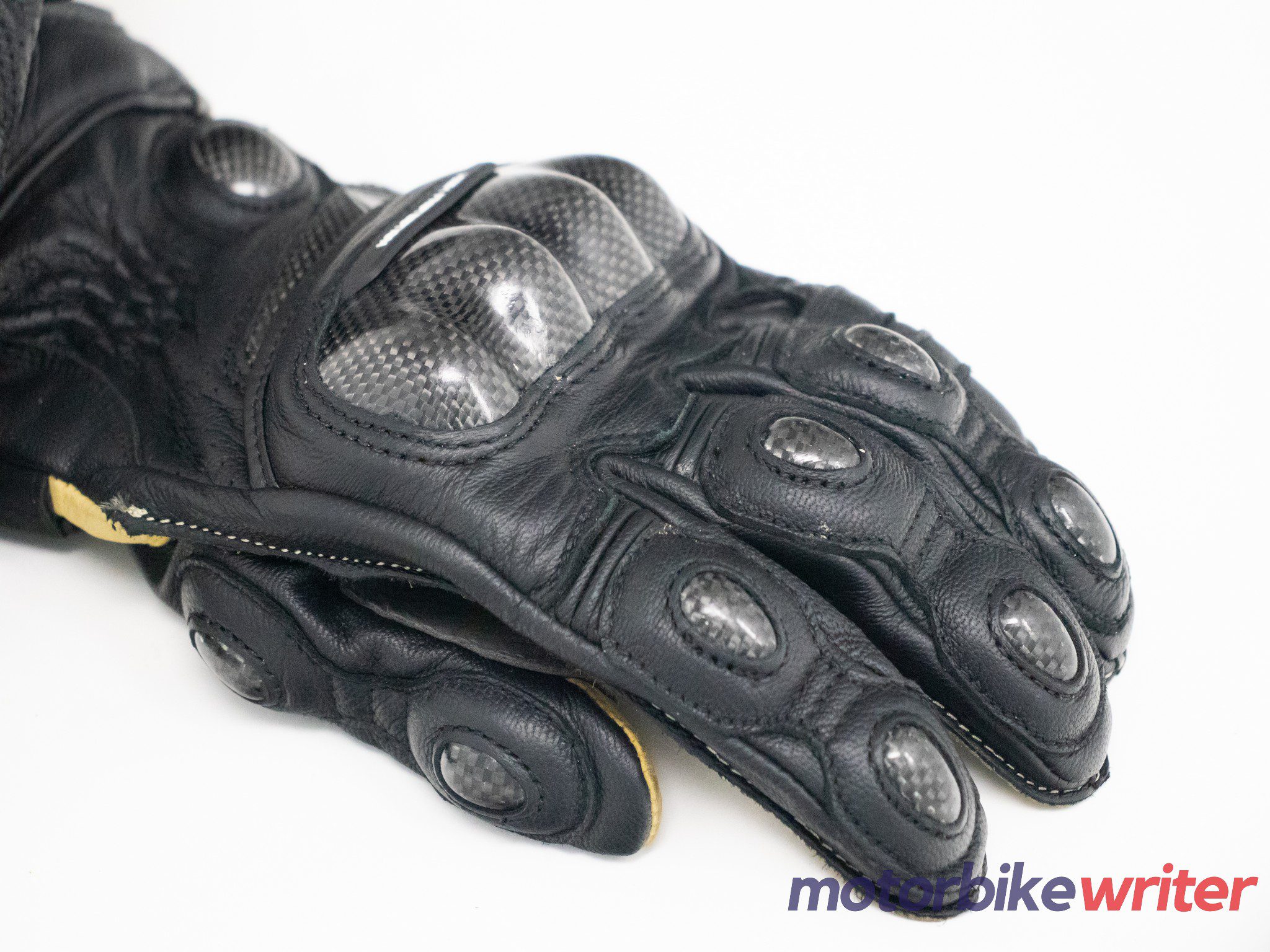 Carbon fiber knuckle protectors on High Racer gloves