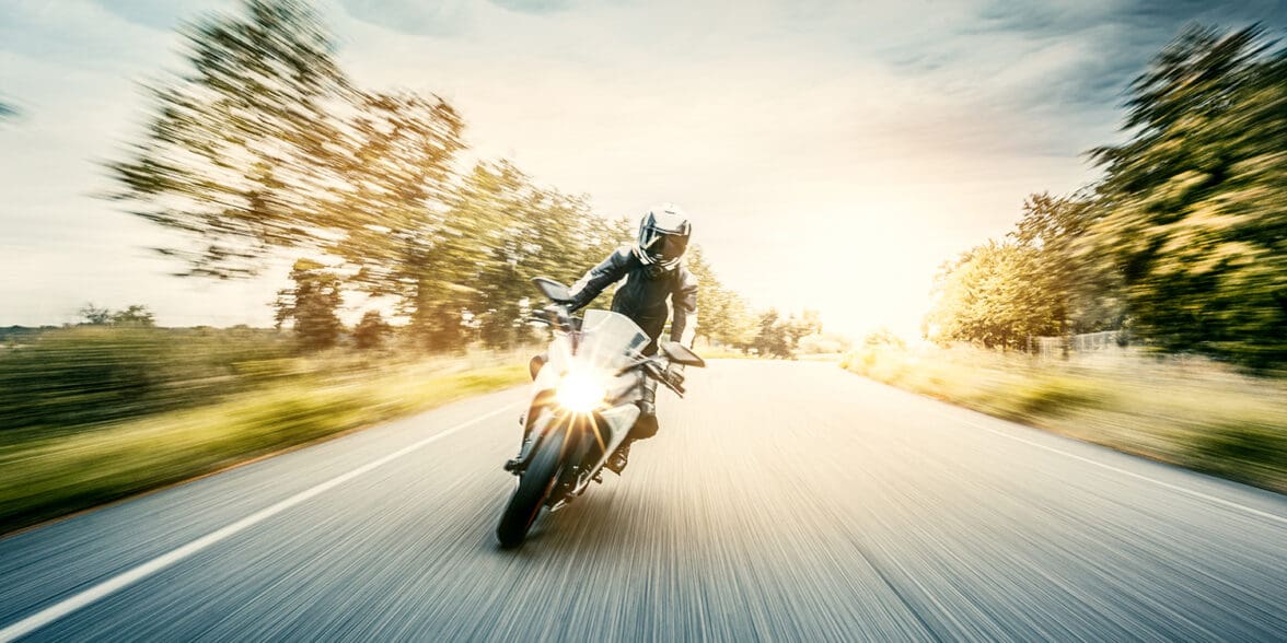 A female motorcyclist enjoying a ride on her motorcycle. Media sourced from Harvard.