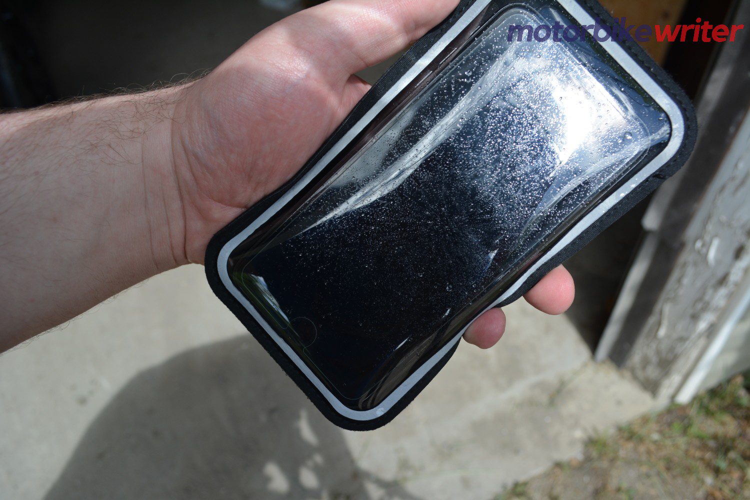 Phone inside plastic Shapeheart sleeve