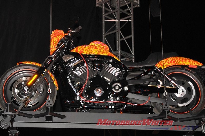 Artist Jack Armstrong unveils his "Cosmic Starship" Harley Davidson on October 21, 2010 in Marina Del Rey, California. Priced at USD one million, this is the world's first and only million dollar Harley. Armstrong was a protege of Andy Warhol and his paintings retail for 300K to 2M USD. AFP PHOTO / GABRIEL BOUYS expensive