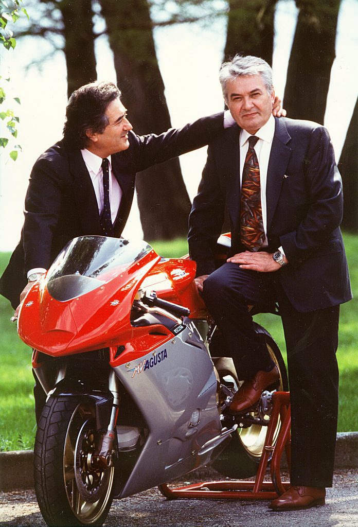 Massimo Tamburini next to a Ducati machine