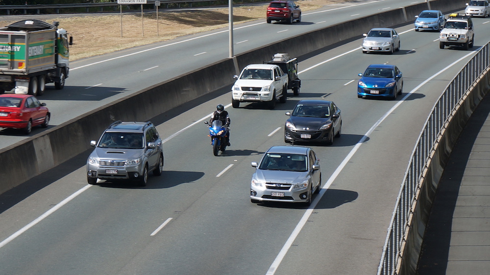 How to ride safely in heavy traffic lane filtering