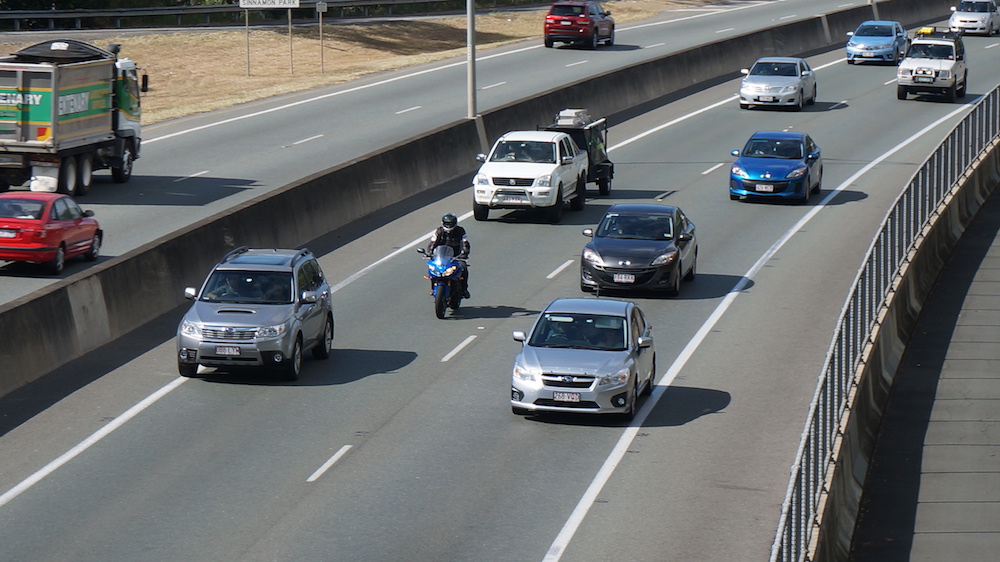 How to ride safely in heavy traffic lane filtering herd