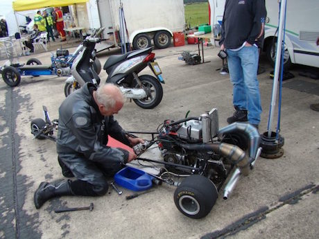 Trevor Duckworth with one o/f his three-wheelers wheelie 