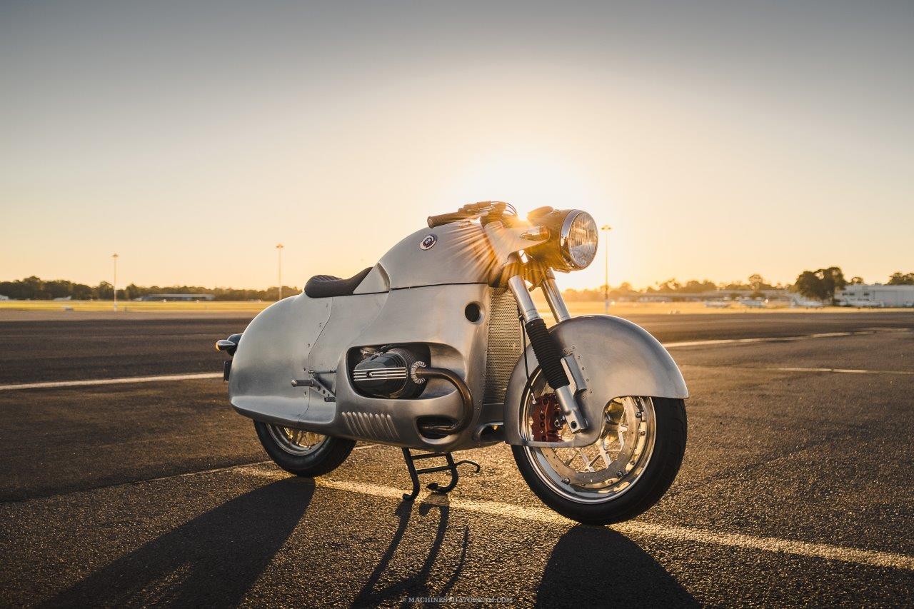 Custom BMW R100 motorcycle at an airport