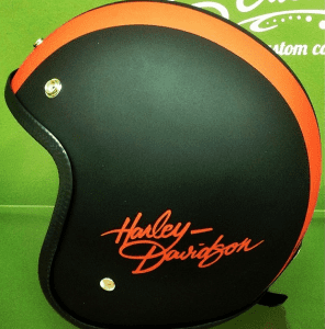 black and orange old school harley davidson helmet