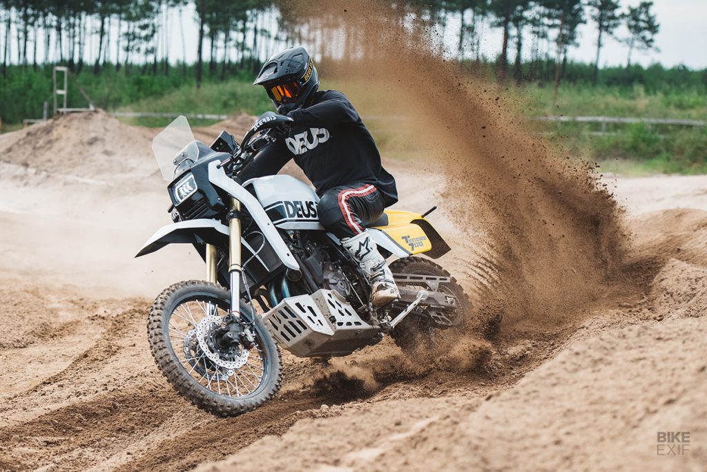 a view of a racer tearing up the dirt on the all-new custom custom Yamaha Ténéré 700, created by Deus Italia