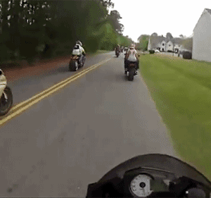 girl falls of motorcycle gif