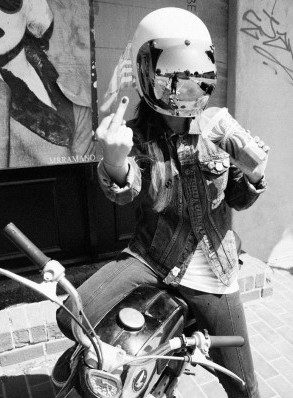 girl moto with middle finger up