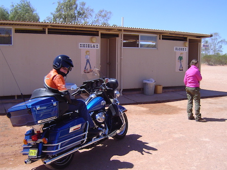 Harley Ultra at a Stuart Highway rest stop speed limit