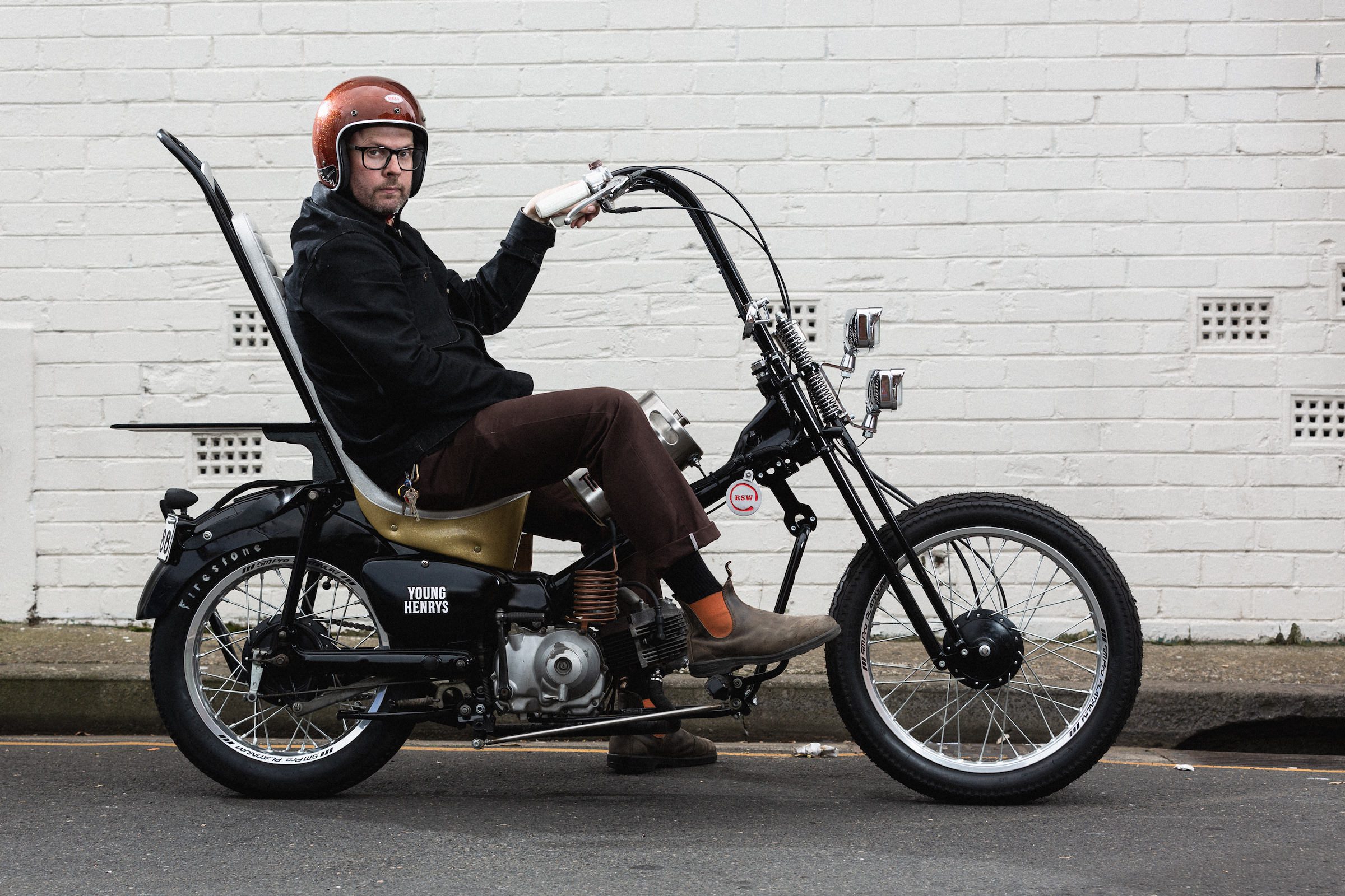 A custom chopper Honda CT110 'Postie' bike in a Sydney street