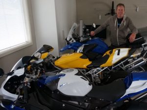 Greg with his bikes in quake city