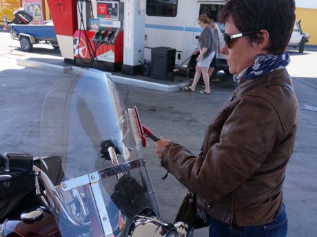 Mrs MBW cleans the windscreen - pillion