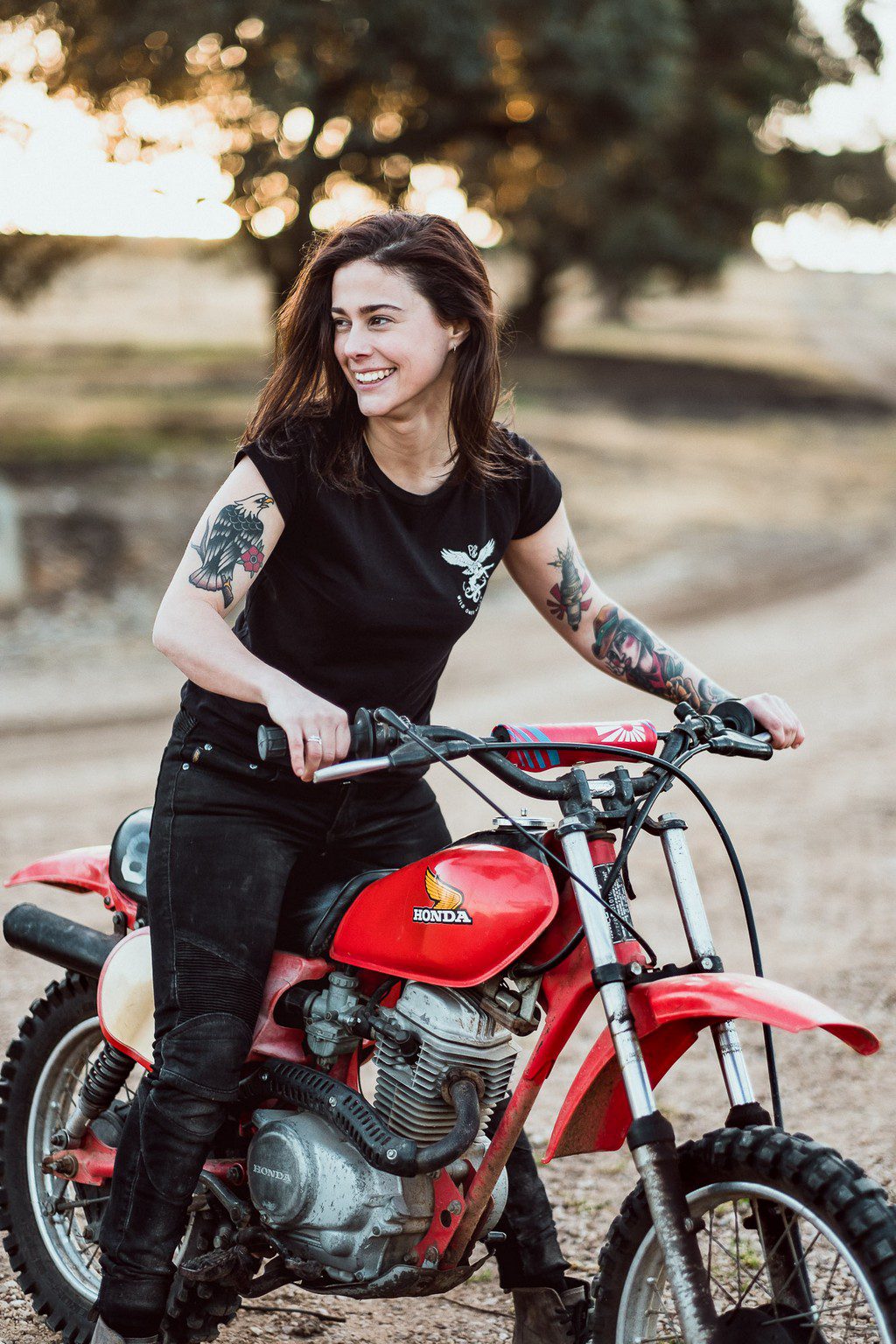 Katie Adbilla on a Honda XL motorcycle in Tasmania