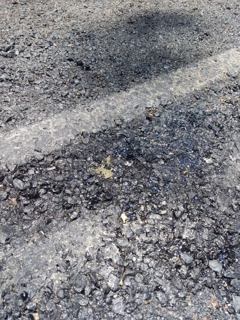 Melting tar on Mt Glorious Rd